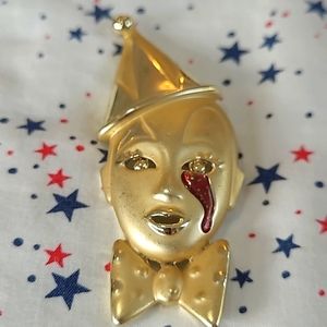 Gold crying clown pin